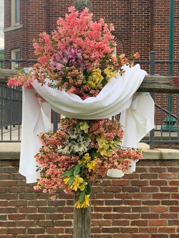 Cross covered in flowers